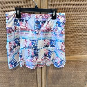 Denise Cromwell athlesiure skirt with built in shorts for comfort.